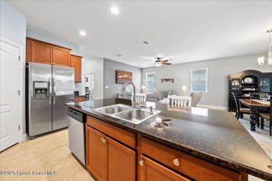 COME  SEE this BEAUTIFULLY MAINTAINED, MOVE-IN READY 3-bedroom on Majors Golf Club At Bayside Lakes in Florida - for sale on GolfHomes.com, golf home, golf lot