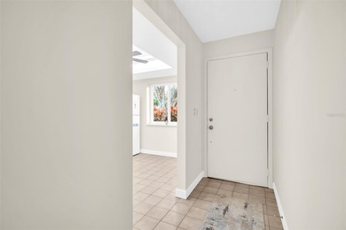 Welcome home to this beautifully updated villa in Villas on the on Highland Lakes Executive Golf Course in Florida - for sale on GolfHomes.com, golf home, golf lot