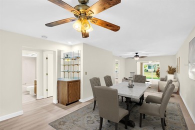 Welcome home to this beautifully updated villa in Villas on the on Highland Lakes Executive Golf Course in Florida - for sale on GolfHomes.com, golf home, golf lot