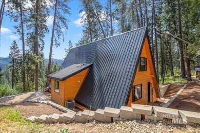 Escape to the tranquility of the mountains in this brand-new on Terrace Lakes Golf Resort in Idaho - for sale on GolfHomes.com, golf home, golf lot