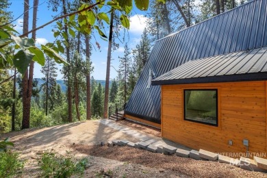 Escape to the tranquility of the mountains in this brand-new on Terrace Lakes Golf Resort in Idaho - for sale on GolfHomes.com, golf home, golf lot
