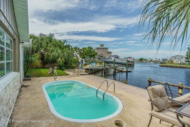 Direct Gulf Access Pool Home - Hudson Beach, FL Your waterfront on Heritage Pines Country Club in Florida - for sale on GolfHomes.com, golf home, golf lot