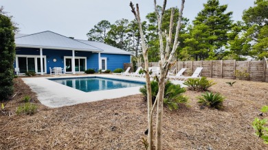 Welcome to 166 Seacrest Drive, a masterpiece of coastal living on Camp Creek Golf Course in Florida - for sale on GolfHomes.com, golf home, golf lot