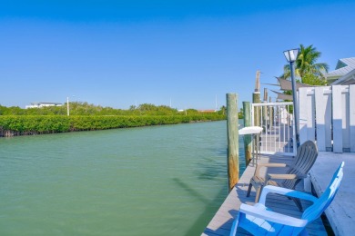 A sought-after opportunity to own a single-family home in Key on Key Colony Beach Golf Course in Florida - for sale on GolfHomes.com, golf home, golf lot