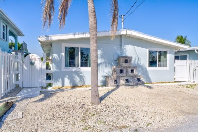 A sought-after opportunity to own a single-family home in Key on Key Colony Beach Golf Course in Florida - for sale on GolfHomes.com, golf home, golf lot