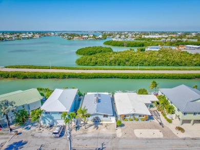 A sought-after opportunity to own a single-family home in Key on Key Colony Beach Golf Course in Florida - for sale on GolfHomes.com, golf home, golf lot