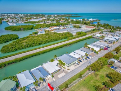 A sought-after opportunity to own a single-family home in Key on Key Colony Beach Golf Course in Florida - for sale on GolfHomes.com, golf home, golf lot