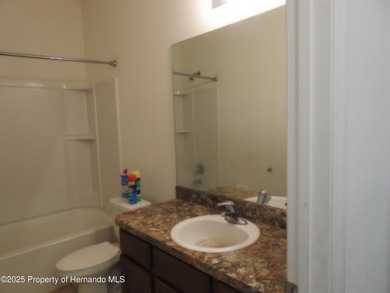 Lovely one owner home in the Sherman Hills golf course community on Sherman Hills Golf Club in Florida - for sale on GolfHomes.com, golf home, golf lot