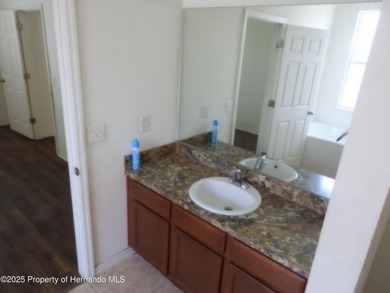 Lovely one owner home in the Sherman Hills golf course community on Sherman Hills Golf Club in Florida - for sale on GolfHomes.com, golf home, golf lot