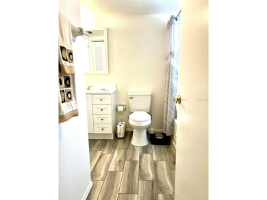 Beautifully nestled ground floor condo among the natural beauty on Country Club At Silver Springs Shores in Florida - for sale on GolfHomes.com, golf home, golf lot