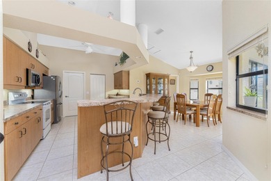 Discover easy Florida living in this well-maintained pool home on Pinemoor West Golf Club in Florida - for sale on GolfHomes.com, golf home, golf lot
