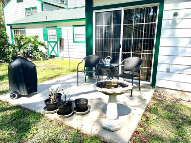 Beautifully nestled ground floor condo among the natural beauty on Country Club At Silver Springs Shores in Florida - for sale on GolfHomes.com, golf home, golf lot