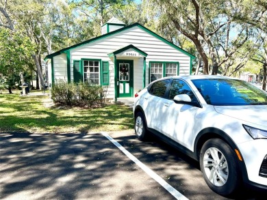 Beautifully nestled ground floor condo among the natural beauty on Country Club At Silver Springs Shores in Florida - for sale on GolfHomes.com, golf home, golf lot