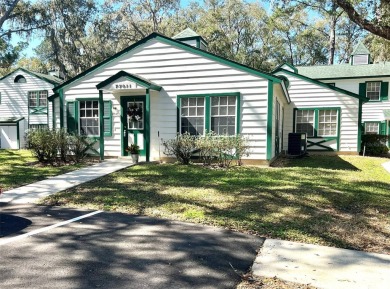 Beautifully nestled ground floor condo among the natural beauty on Country Club At Silver Springs Shores in Florida - for sale on GolfHomes.com, golf home, golf lot