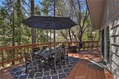 Escape to this stunning 4-bedroom, 3-bathroom mountain cabin on Lake Arrowhead Country Club in California - for sale on GolfHomes.com, golf home, golf lot