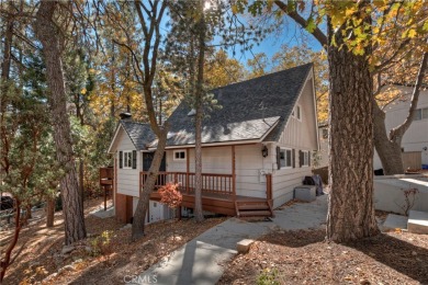 Escape to this stunning 4-bedroom, 3-bathroom mountain cabin on Lake Arrowhead Country Club in California - for sale on GolfHomes.com, golf home, golf lot