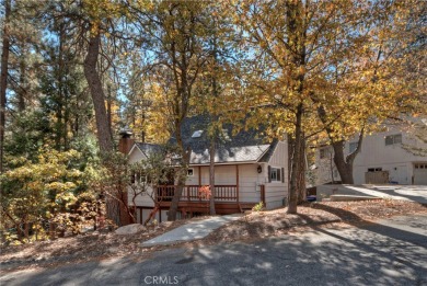 Escape to this stunning 4-bedroom, 3-bathroom mountain cabin on Lake Arrowhead Country Club in California - for sale on GolfHomes.com, golf home, golf lot