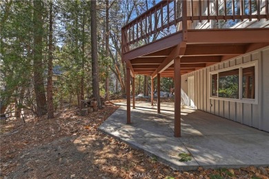 Escape to this stunning 4-bedroom, 3-bathroom mountain cabin on Lake Arrowhead Country Club in California - for sale on GolfHomes.com, golf home, golf lot