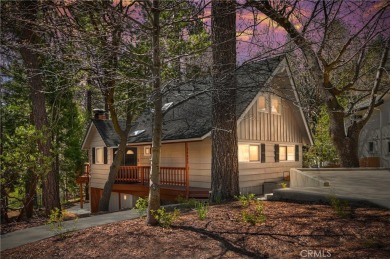 Escape to this stunning 4-bedroom, 3-bathroom mountain cabin on Lake Arrowhead Country Club in California - for sale on GolfHomes.com, golf home, golf lot