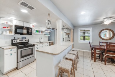 Coastal Cottage centrally located on Eleventh, zoned for NIGHTLY on Palmilla Beach Golf Club in Texas - for sale on GolfHomes.com, golf home, golf lot