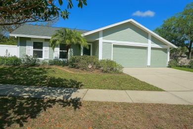 Welcome to this beautifully updated 3-bedroom, 2-bathroom home on Westchase Golf Club in Florida - for sale on GolfHomes.com, golf home, golf lot
