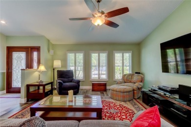 Welcome to this beautifully updated 3-bedroom, 2-bathroom home on Westchase Golf Club in Florida - for sale on GolfHomes.com, golf home, golf lot