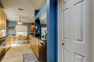 Welcome to this beautifully updated 3-bedroom, 2-bathroom home on Westchase Golf Club in Florida - for sale on GolfHomes.com, golf home, golf lot