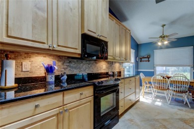Welcome to this beautifully updated 3-bedroom, 2-bathroom home on Westchase Golf Club in Florida - for sale on GolfHomes.com, golf home, golf lot