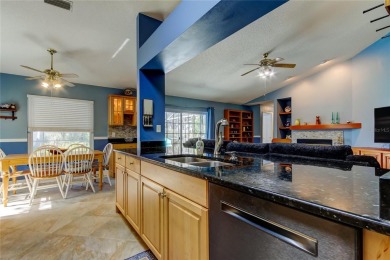 Welcome to this beautifully updated 3-bedroom, 2-bathroom home on Westchase Golf Club in Florida - for sale on GolfHomes.com, golf home, golf lot