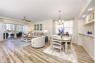 Discover luxury living in this stunning corner condo featuring on East Bay Golf Club in Florida - for sale on GolfHomes.com, golf home, golf lot