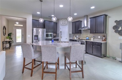 Former Elmwood Model Home in Cascades at Southern Hills (55+ on Southern Hills Plantation Club in Florida - for sale on GolfHomes.com, golf home, golf lot