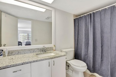 Discover serene lakeside living in this spacious 1-bedroom, 1 on Palm-Aire Country Club and Resort - Palms in Florida - for sale on GolfHomes.com, golf home, golf lot