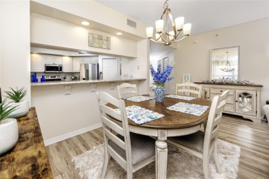 Discover luxury living in this stunning corner condo featuring on East Bay Golf Club in Florida - for sale on GolfHomes.com, golf home, golf lot
