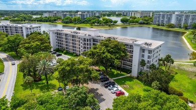 Discover serene lakeside living in this spacious 1-bedroom, 1 on Palm-Aire Country Club and Resort - Palms in Florida - for sale on GolfHomes.com, golf home, golf lot