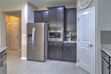 Former Elmwood Model Home in Cascades at Southern Hills (55+ on Southern Hills Plantation Club in Florida - for sale on GolfHomes.com, golf home, golf lot