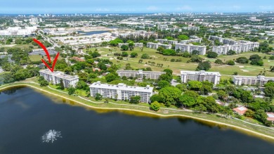Discover serene lakeside living in this spacious 1-bedroom, 1 on Palm-Aire Country Club and Resort - Palms in Florida - for sale on GolfHomes.com, golf home, golf lot