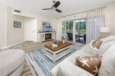 Discover luxury living in this stunning corner condo featuring on East Bay Golf Club in Florida - for sale on GolfHomes.com, golf home, golf lot