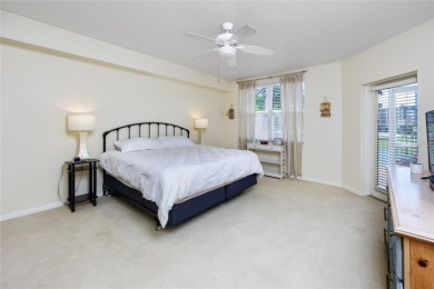 Discover luxury living in this stunning corner condo featuring on East Bay Golf Club in Florida - for sale on GolfHomes.com, golf home, golf lot