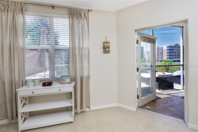 Discover luxury living in this stunning corner condo featuring on East Bay Golf Club in Florida - for sale on GolfHomes.com, golf home, golf lot