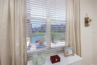 Discover luxury living in this stunning corner condo featuring on East Bay Golf Club in Florida - for sale on GolfHomes.com, golf home, golf lot
