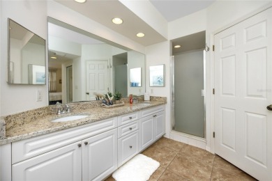 Discover luxury living in this stunning corner condo featuring on East Bay Golf Club in Florida - for sale on GolfHomes.com, golf home, golf lot