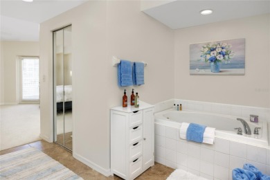 Discover luxury living in this stunning corner condo featuring on East Bay Golf Club in Florida - for sale on GolfHomes.com, golf home, golf lot