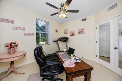 Discover luxury living in this stunning corner condo featuring on East Bay Golf Club in Florida - for sale on GolfHomes.com, golf home, golf lot
