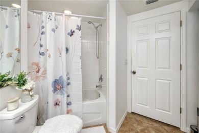 Discover luxury living in this stunning corner condo featuring on East Bay Golf Club in Florida - for sale on GolfHomes.com, golf home, golf lot