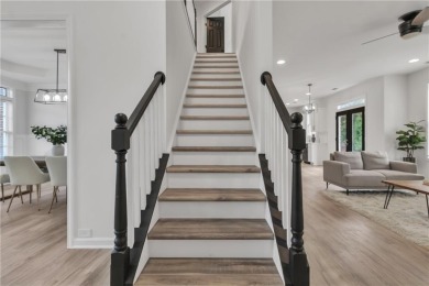 Discover this completely renovated 5-bedroom, 2.5-bathroom home on Wolf Creek Golf Course in Georgia - for sale on GolfHomes.com, golf home, golf lot