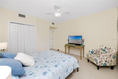 Discover luxury living in this stunning corner condo featuring on East Bay Golf Club in Florida - for sale on GolfHomes.com, golf home, golf lot