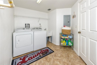 Discover luxury living in this stunning corner condo featuring on East Bay Golf Club in Florida - for sale on GolfHomes.com, golf home, golf lot