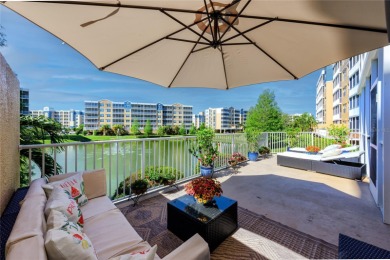 Discover luxury living in this stunning corner condo featuring on East Bay Golf Club in Florida - for sale on GolfHomes.com, golf home, golf lot