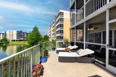 Discover luxury living in this stunning corner condo featuring on East Bay Golf Club in Florida - for sale on GolfHomes.com, golf home, golf lot
