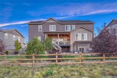 This exquisite residence offers a perfect blend of modern on Country Club at Castle Pines in Colorado - for sale on GolfHomes.com, golf home, golf lot